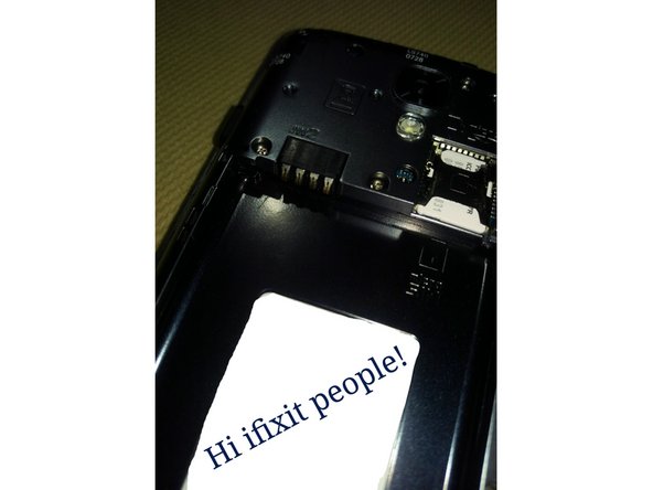 LG Volt LS740 Charging Port Replacement, Remove Battery & Sim Card: crwdns2935265:03crwdnd2935265:02crwdnd2935265:02crwdne2935265:0