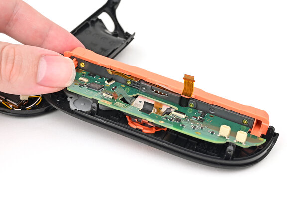 Joy-Con 2 (Right) Joystick Replacement, Install the board: crwdns2935265:031crwdnd2935265:03crwdnd2935265:03crwdne2935265:0