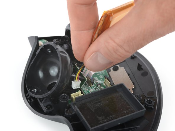 Logitech MX Ergo Battery Replacement, Remove the battery: crwdns2935265:016crwdnd2935265:02crwdnd2935265:03crwdne2935265:0