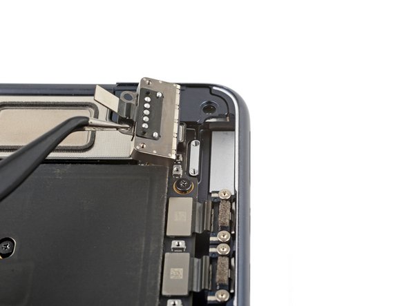 MacBook Air 2022 (M2) MagSafe Port Replacement, Remove the MagSafe port: crwdns2935265:016crwdnd2935265:02crwdnd2935265:03crwdne2935265:0