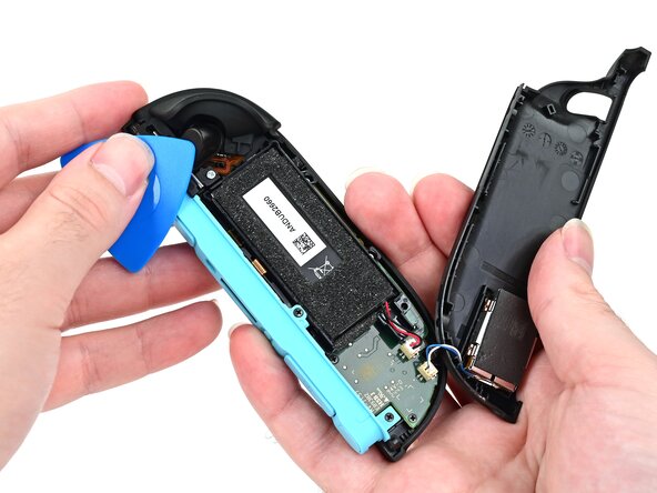 Joy-Con 2 (Left) Battery Replacement, Install the back cover: crwdns2935265:021crwdnd2935265:01crwdnd2935265:03crwdne2935265:0