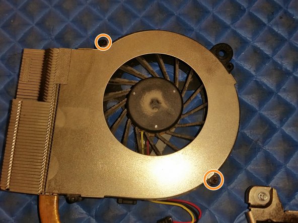 HP g4 Heatsink/Fan (or Motherboard) Replacement, Remove fan clip & screws: crwdns2935265:010crwdnd2935265:02crwdnd2935265:03crwdne2935265:0