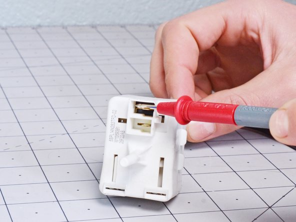 Whirlpool Refrigerator Start Relay Assembly Replacement, Meter the start relay assembly: crwdns2935265:07crwdnd2935265:03crwdnd2935265:03crwdne2935265:0