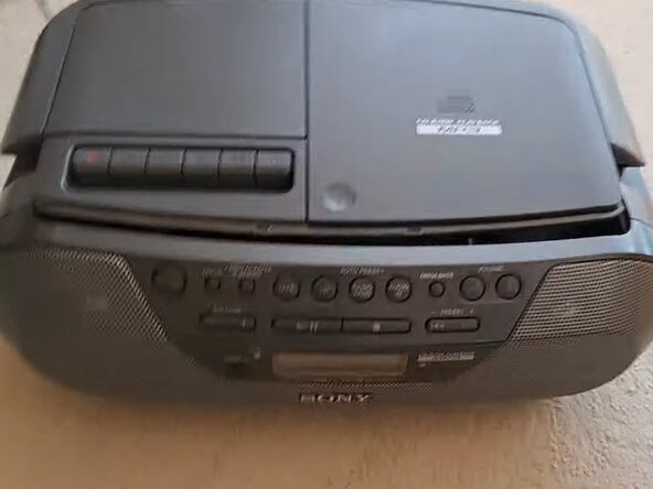 Sony CFD-S07CP: CD and Tape mechanisms, Removing the top shell: crwdns2935265:03crwdnd2935265:02crwdnd2935265:03crwdne2935265:0