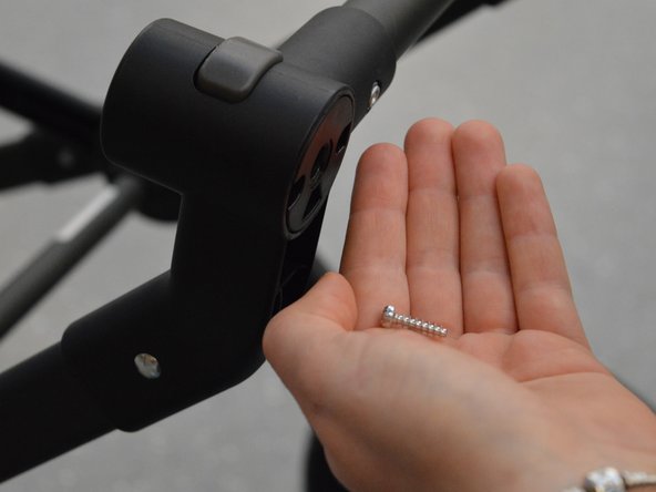 Bugaboo Cameleon 1 and 3 Swivel Wheel Lock Replacement, Remove screws: step 4, image 3 of 3