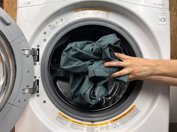 How to Reapply Durable Water Repellent (DWR) Coating, Load the washer: crwdns2935265:03crwdnd2935265:01crwdnd2935265:01crwdne2935265:0
