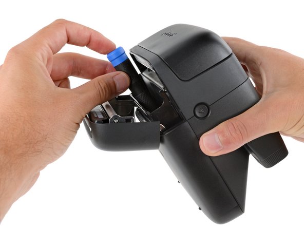 Polaroid Flip Bottom Shell Replacement, Remove the bottom shell screw: crwdns2935265:03crwdnd2935265:03crwdnd2935265:03crwdne2935265:0