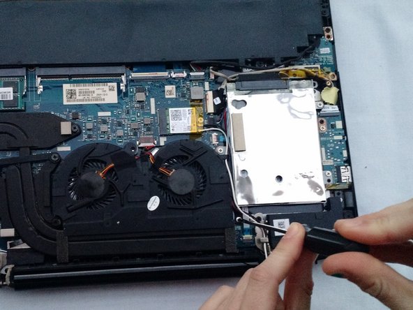 Lenovo IdeaPad Y40-70 Laptop Fan Replacement, Remove the fan: crwdns2935265:03crwdnd2935265:02crwdnd2935265:03crwdne2935265:0