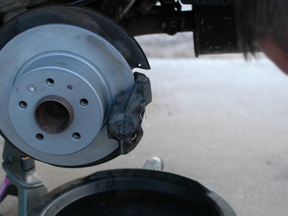 Mercedes W123 Brake Disc, Rear Replacement, Re-install the caliper: crwdns2935265:06crwdnd2935265:02crwdnd2935265:03crwdne2935265:0