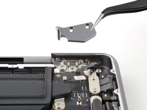 MacBook Pro 14" Late 2023 (M3) Screen Replacement, Remove the hinge covers: crwdns2935265:036crwdnd2935265:02crwdnd2935265:03crwdne2935265:0