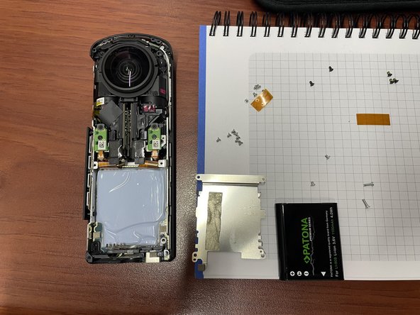 Ricoh Theta Z1 Battery Replacement, Replacing the Battery: crwdns2935265:07crwdnd2935265:03crwdnd2935265:03crwdne2935265:0