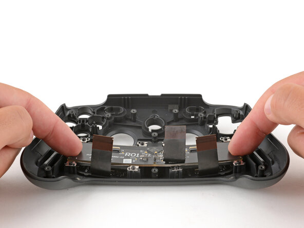 Steam Controller (2nd Gen, 2026) Buttons Replacement, Remove the FSC board: crwdns2935265:027crwdnd2935265:01crwdnd2935265:03crwdne2935265:0