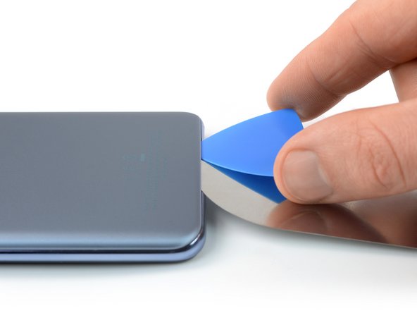 OnePlus Nord 2 5G Battery Replacement, Insert an opening pick: crwdns2935265:03crwdnd2935265:02crwdnd2935265:03crwdne2935265:0