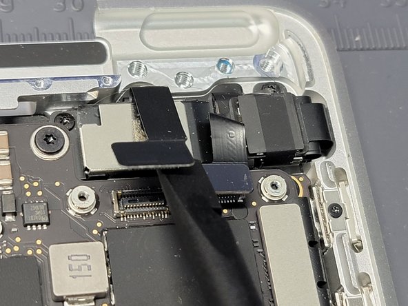 MacBook Pro 13" Two Thunderbolt Ports 2020 Touchbar Removal, Disconnecting Flex Cables: crwdns2935265:032crwdnd2935265:02crwdnd2935265:03crwdne2935265:0