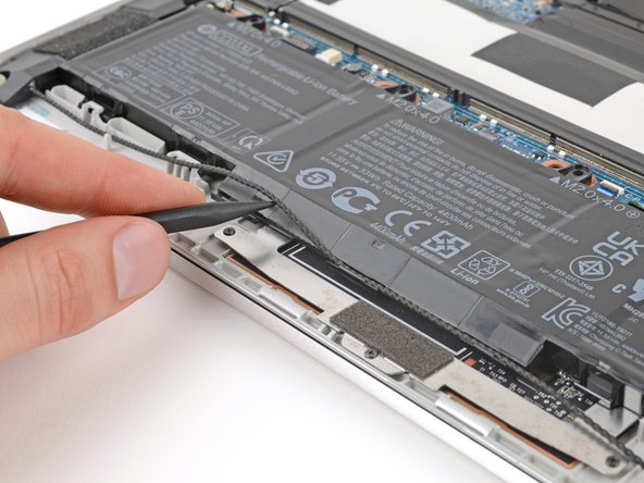 HP EliteBook 840 Aero G8 Battery Replacement, Unclip the speaker cable: crwdns2935265:08crwdnd2935265:02crwdnd2935265:03crwdne2935265:0