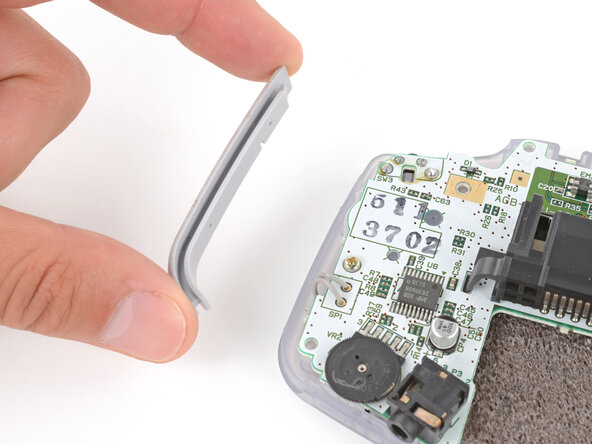 Game Boy Advance Speaker Replacement, Remove the side bumpers: crwdns2935265:07crwdnd2935265:03crwdnd2935265:03crwdne2935265:0