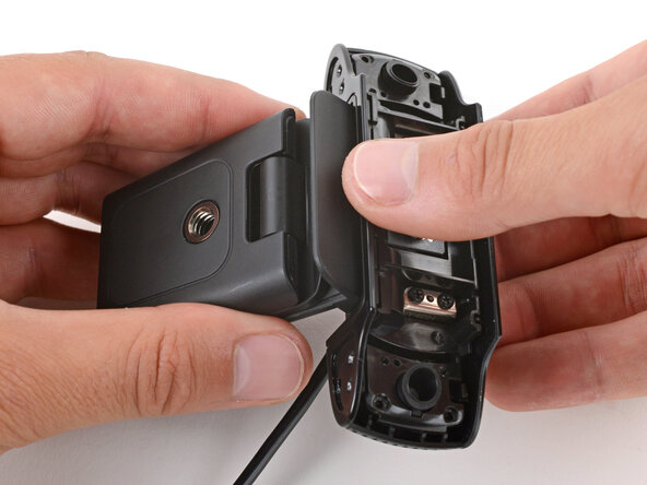 How to Open Your Logitech C920s Webcam, Fully open the hinges: crwdns2935265:010crwdnd2935265:02crwdnd2935265:02crwdne2935265:0