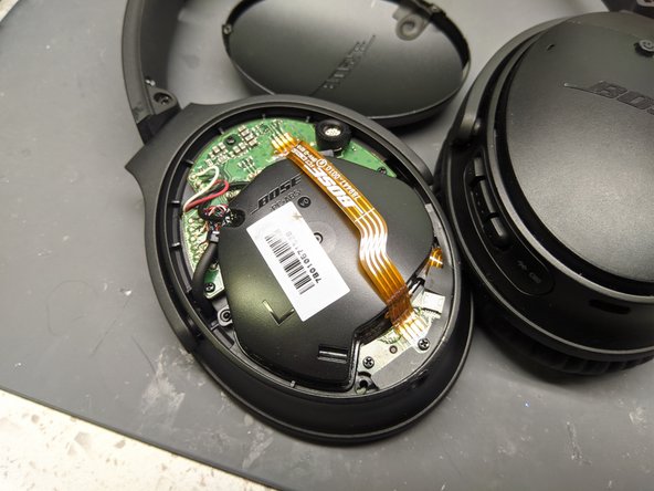 Remove Dislodged Plug Parts, Remove Left Backplate: crwdns2935265:03crwdnd2935265:02crwdnd2935265:02crwdne2935265:0