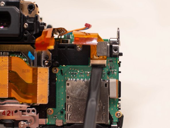 Canon EOS Rebel T5 SD Card Board Replacement, SD Card Board: crwdns2935265:019crwdnd2935265:02crwdnd2935265:03crwdne2935265:0