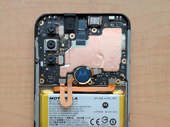 Motorola Moto G Play (2023) Teardown, Remove the motherboard cover: crwdns2935265:05crwdnd2935265:03crwdnd2935265:03crwdne2935265:0