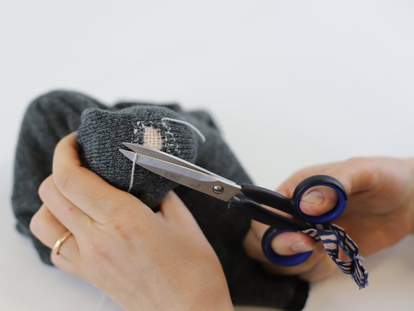 How to repair a hole in a knitted fabric (using darning), Tidy the repair: step 6, image 1 of 3