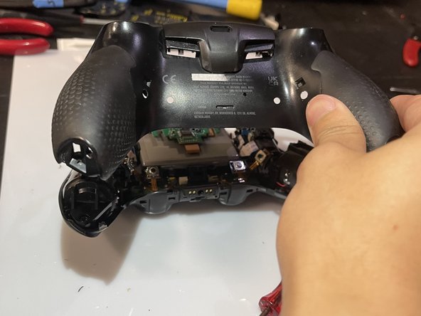 SCUF Reflex Joystick Replacement, Remove the rear case: crwdns2935265:07crwdnd2935265:02crwdnd2935265:02crwdne2935265:0