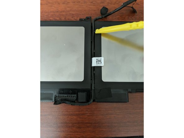 Dell Latitude 7480  Battery Replacement, Install the battery cable: crwdns2935265:05crwdnd2935265:02crwdnd2935265:02crwdne2935265:0