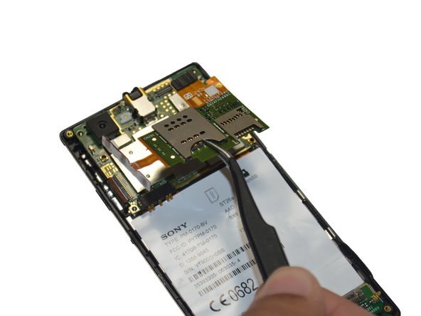 Sony Xperia J SIM Card/Micro USB Reader Replacement, Removing Parts: crwdns2935265:010crwdnd2935265:02crwdnd2935265:02crwdne2935265:0