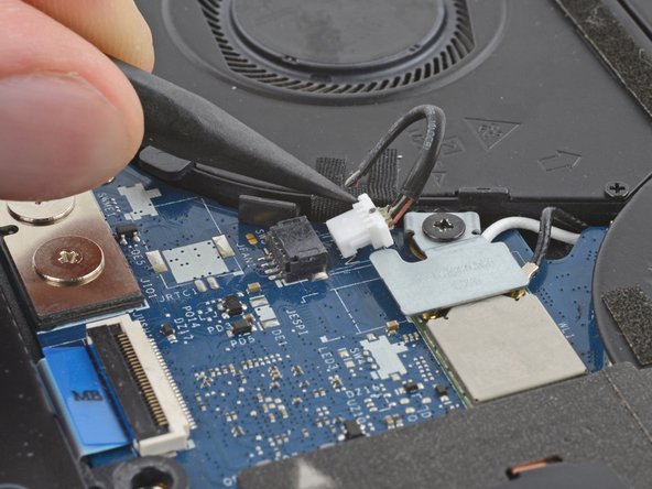 Dell Latitude 7410 Fan Replacement, Disconnect the fan: crwdns2935265:010crwdnd2935265:03crwdnd2935265:03crwdne2935265:0