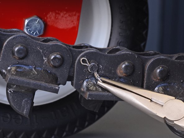 Barreto Trencher E718MTH4S 2016 Chain Roller Spacer Replacement, Remove the cotter pin: step 3, image 3 of 3