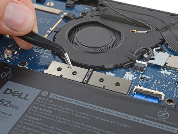 Dell Latitude 7410 I/O Board Replacement, Remove the interconnect pad: crwdns2935265:016crwdnd2935265:02crwdnd2935265:03crwdne2935265:0