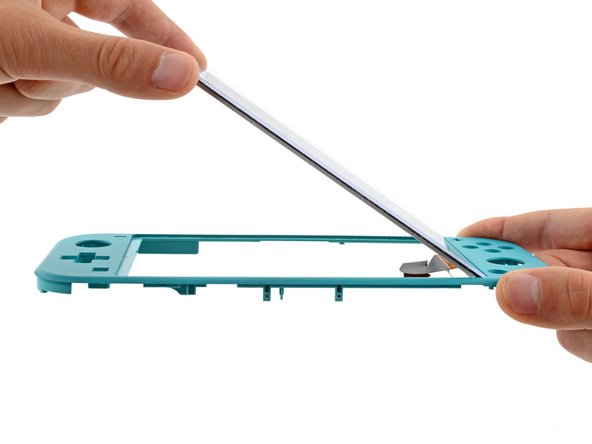 How to Replace the Screen Adhesive on Your Switch Lite, Place the screen on the frame: crwdns2935265:07crwdnd2935265:02crwdnd2935265:02crwdne2935265:0