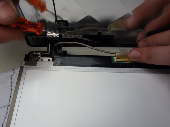 why! W650SZ LCD Screen Replacement, Remove the Connector Tape: crwdns2935265:08crwdnd2935265:03crwdnd2935265:03crwdne2935265:0