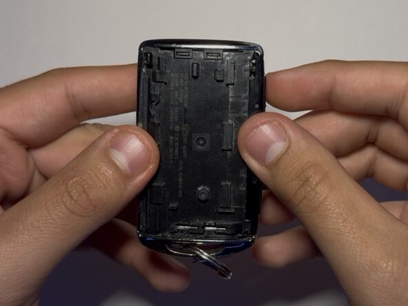 Mazda CX-30 Key Fob Battery Replacement: step 2, image 1 of 3