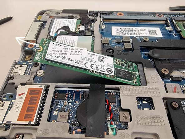 ASUS Laptop Battery, SSD, and RAM Removal, Remove the SSD: crwdns2935265:04crwdnd2935265:02crwdnd2935265:02crwdne2935265:0