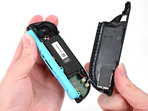 Joy-Con 2 (Left) Battery Replacement, Release the back cover: crwdns2935265:09crwdnd2935265:03crwdnd2935265:03crwdne2935265:0