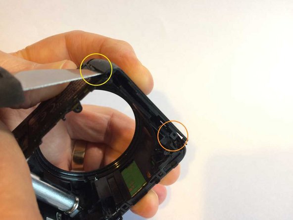 Panasonic Lumix DMC-TZ35 Top assembly removal/replacement, Removing the side panels: crwdns2935265:09crwdnd2935265:03crwdnd2935265:03crwdne2935265:0