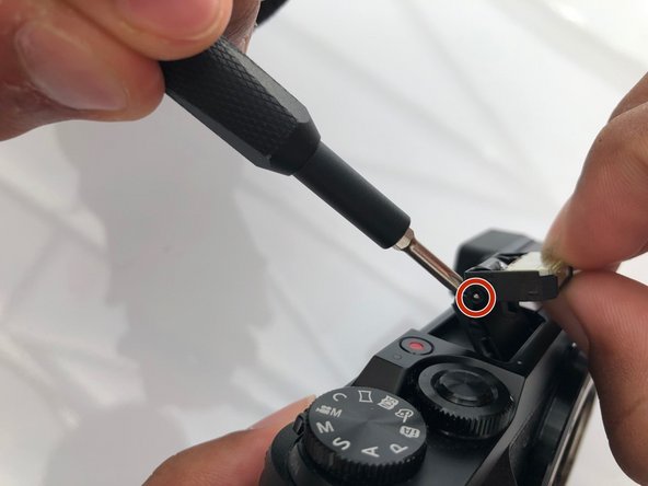 Panasonic Lumix DMC-GX85 Pop-up Flash Spring Replacement: crwdns2935265:04crwdnd2935265:02crwdnd2935265:02crwdne2935265:0