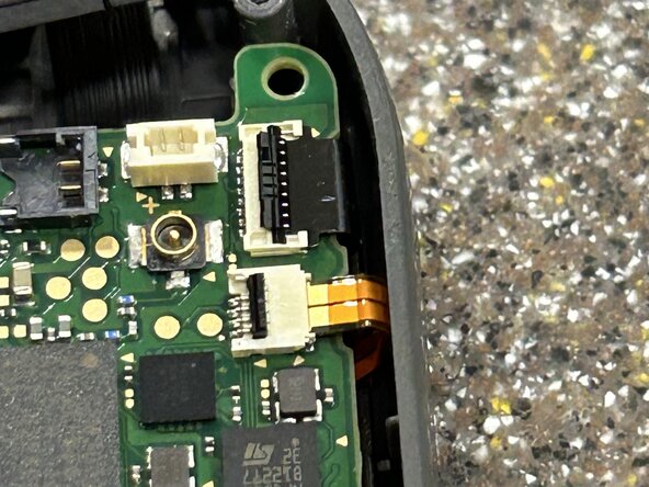 Right Joy-Con Teardown: crwdns2935265:026crwdnd2935265:02crwdnd2935265:02crwdne2935265:0