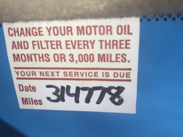 Write down date of oil change and amount of miles on vehicle to indicate when you should change your oil again.