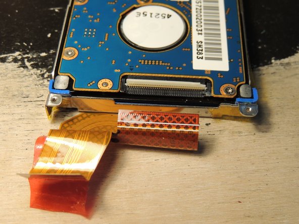 Dell DJ 2nd Generation Disassembly, Disconnect the hard drive (again): crwdns2935265:013crwdnd2935265:02crwdnd2935265:02crwdne2935265:0