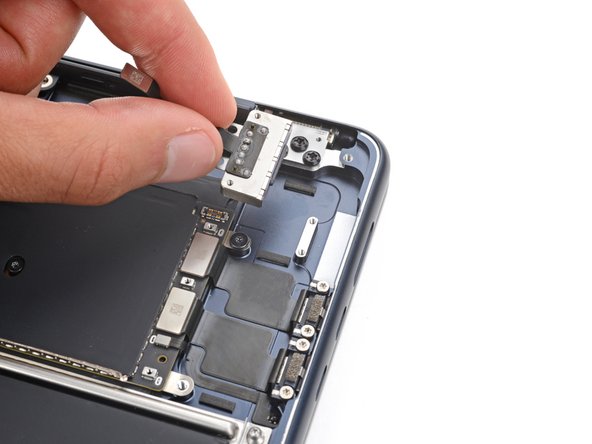 MacBook Air 15" 2023 MagSafe Port Replacement, Remove the MagSafe port: crwdns2935265:023crwdnd2935265:02crwdnd2935265:02crwdne2935265:0