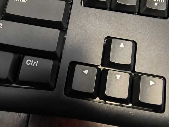 How to Fix a Jammed Key on a Logitech K120: crwdns2935265:06crwdnd2935265:02crwdnd2935265:02crwdne2935265:0