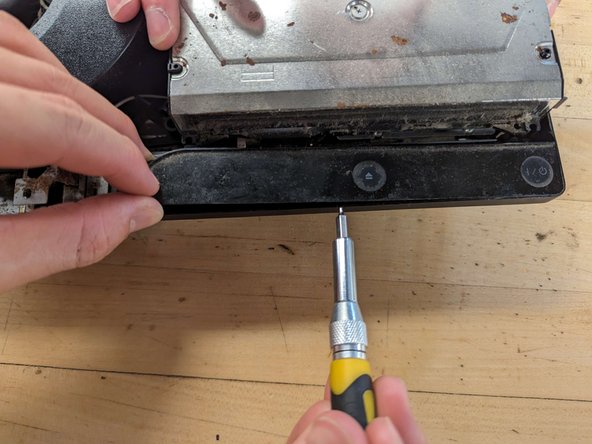 PlayStation 3 Slim Thermal Paste Replacement, Removing the power button board: crwdns2935265:013crwdnd2935265:02crwdnd2935265:03crwdne2935265:0