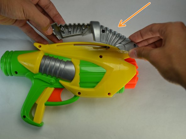 Air Blasters Tek Six Reload Slider Spring Replacement, Remove screw of the grey slider: crwdns2935265:01crwdnd2935265:03crwdnd2935265:03crwdne2935265:0