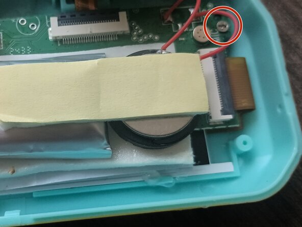 Omega Mart Photato unsticking shutter/select button, Remove three mainboard screws.: step 7, image 2 of 2