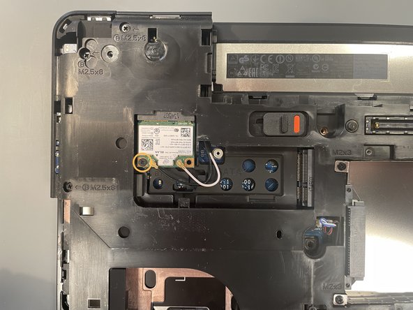 Dell Latitude E5540 Disassembly, Disconnect and Remove the Bluetooth and Wifi Module: crwdns2935265:07crwdnd2935265:02crwdnd2935265:03crwdne2935265:0