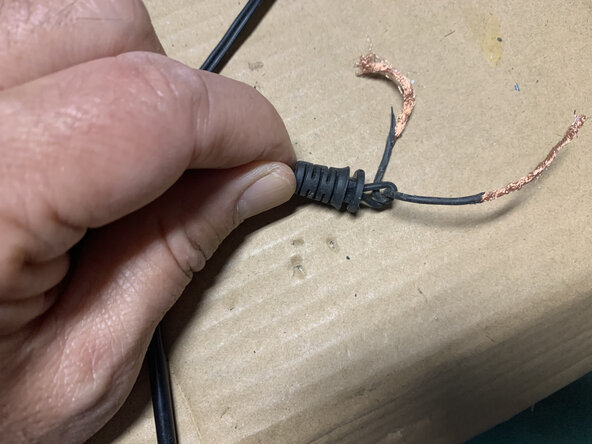 Power Brick Cord Repair, Push DC Cord Through Stress-Relief Collar: crwdns2935265:04crwdnd2935265:03crwdnd2935265:03crwdne2935265:0