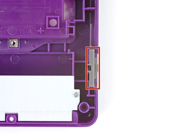 How to Reshell Your Game Boy Advance SP, Remove the power switch cover: crwdns2935265:060crwdnd2935265:01crwdnd2935265:02crwdne2935265:0