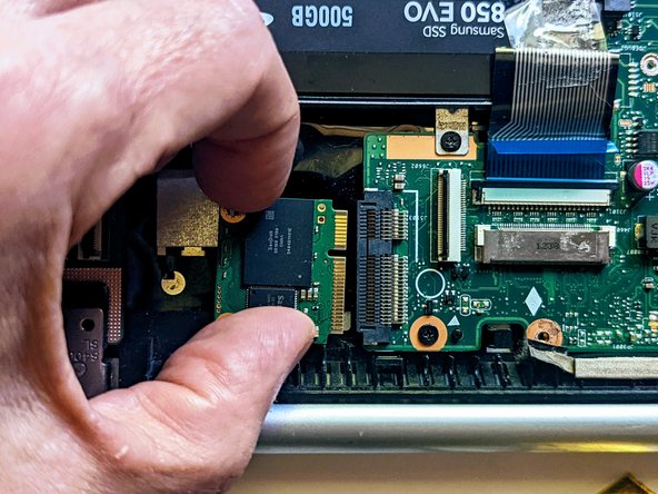 ASUS VivoBook S400C Motherboard Replacement, Unplug the SSD from the motherboard: crwdns2935265:028crwdnd2935265:02crwdnd2935265:02crwdne2935265:0